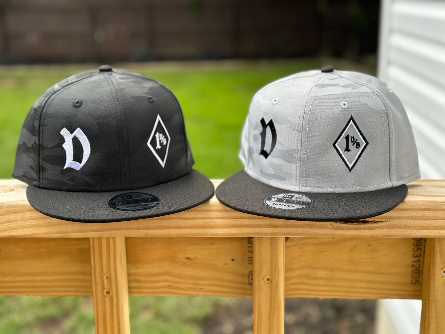 New Era® Camo Flat Bill Snapback Cap - 1%