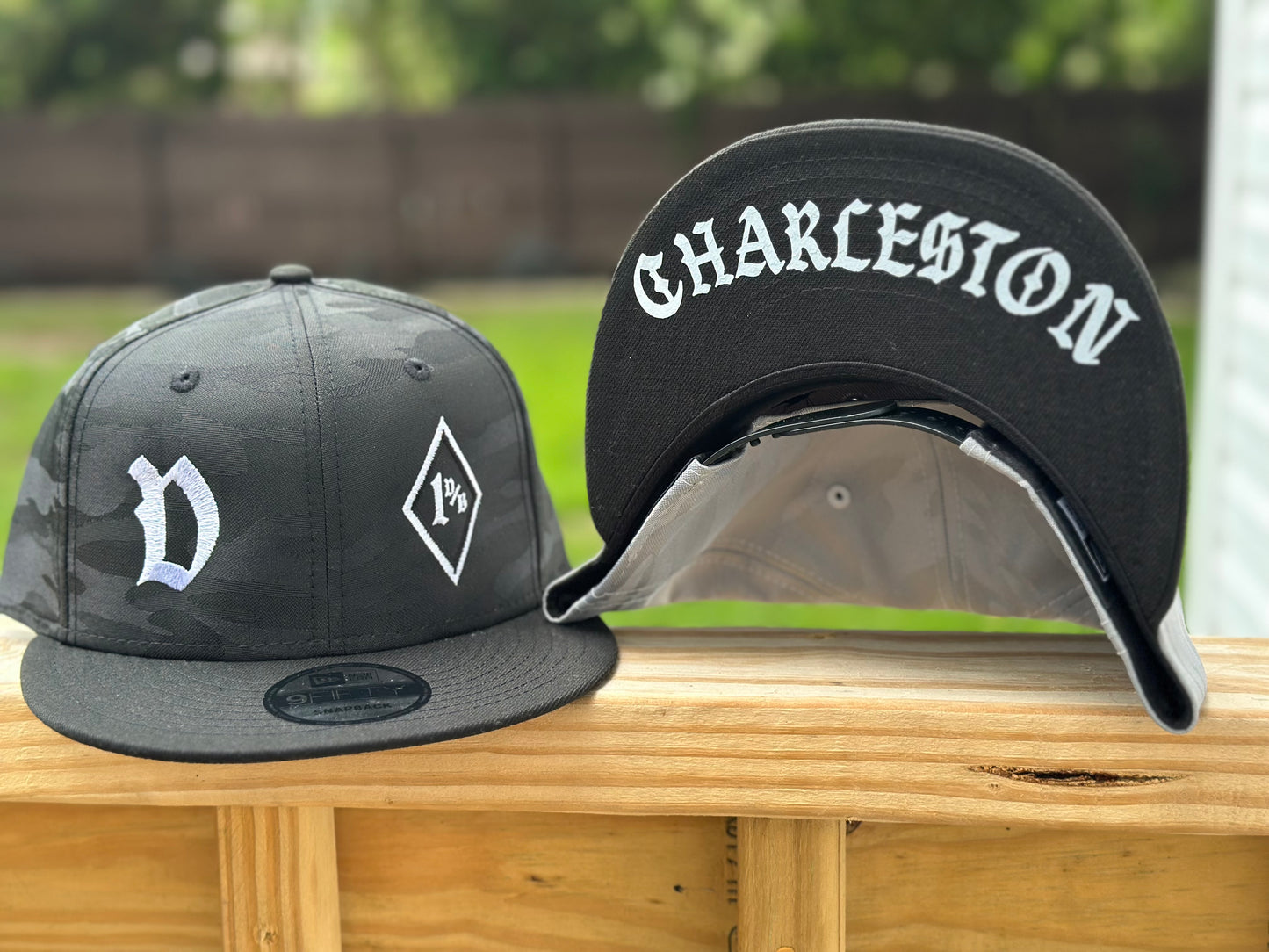 New Era® Camo Flat Bill Snapback Cap - 1%